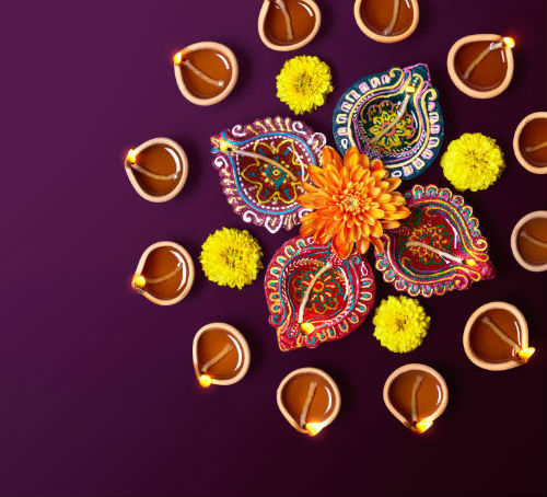 Colourful Lamps With Flowers at Diwali