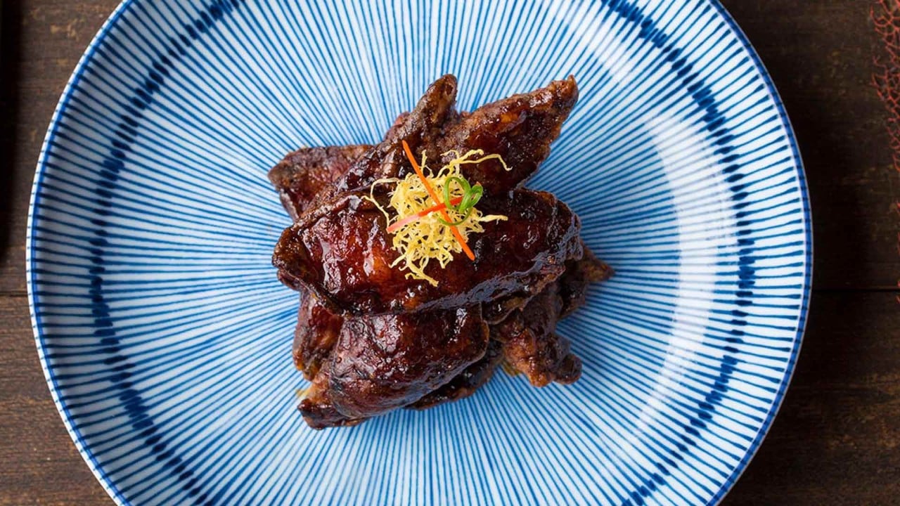 Smoked cod fish, a signature instagrammable dish at Mott 32 Singapore