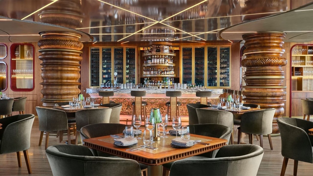 A rooftop dining restaurant with a view of downtown Singapore