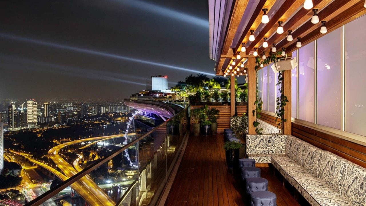 Night view of Singapore from a rooftop bar and restaurant at Marina Bay Sands